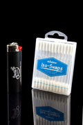 A lighter and a pack of isopropyl alcohol cotton swabs, used for cleaning cannabis tools, displayed on a reflective surface.