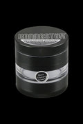 A close-up, angled view of the Kannastor 2.5" 4-Piece Grinder, showcasing its metallic finish and circular design.