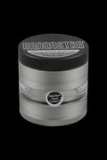 Close-up of the gunmetal Kannastor Multi Chamber Grinder, showcasing its multi-tiered design and metallic finish.