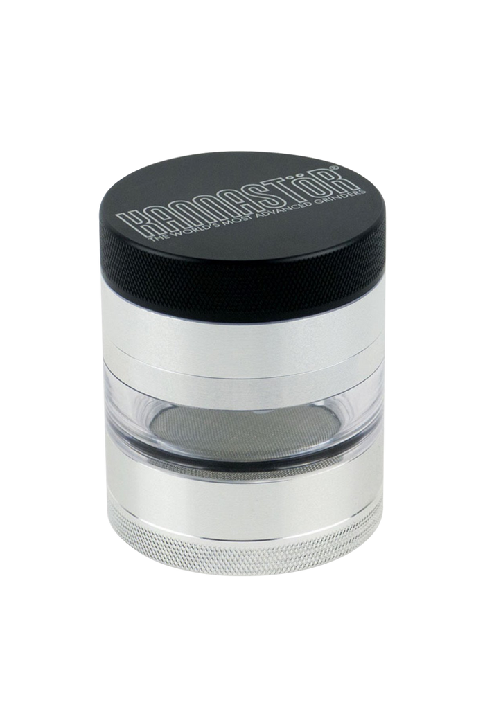 A close-up of the Kannastor Jar Body Multi Chamber 2.2" Grinder, showcasing its cylindrical metal body and multi-tiered chamber design.