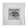 The artwork 'Marks Left by the Years' by Kiana Honarmand features an abstract geometric composition in black and white, comprising hand-cut and woven giclee prints. The pattern shows intricate pixelated shapes and angular forms creating a maze-like structure, framed in crisp white matting. The 16x16 inch piece displays a monochromatic palette with varying tones and textures.