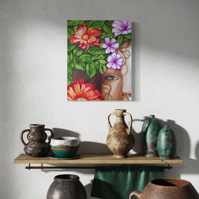 The artwork 'Memories of the Season II' by Carlos Gamez de Francisco features vibrant tropical flowers in coral red and purple hues, framed by lush green foliage, partially obscuring a glimpse of a person's eye and cheek. The acrylic on wood painting combines hyperrealistic botanical elements with portrait artistry in a 16x20 inch composition.