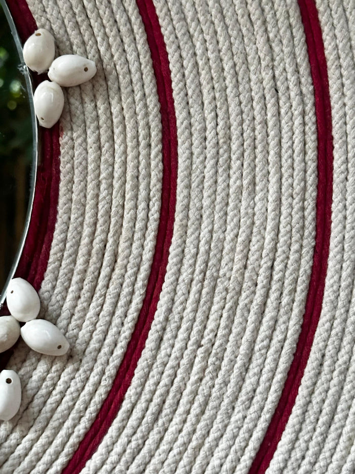 Handcrafted with cotton yarn and sea shells, it creates a captivating focal point in any interior.