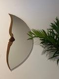Dual purpose,minimalistic hanging sculptural mirror,which can be hanged in 2 ways.It radiates the beauty of nature