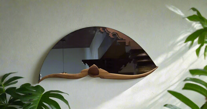 Dual purpose,minimalistic hanging sculptural mirror,which can be hanged in 2 ways.It radiates the beauty of nature