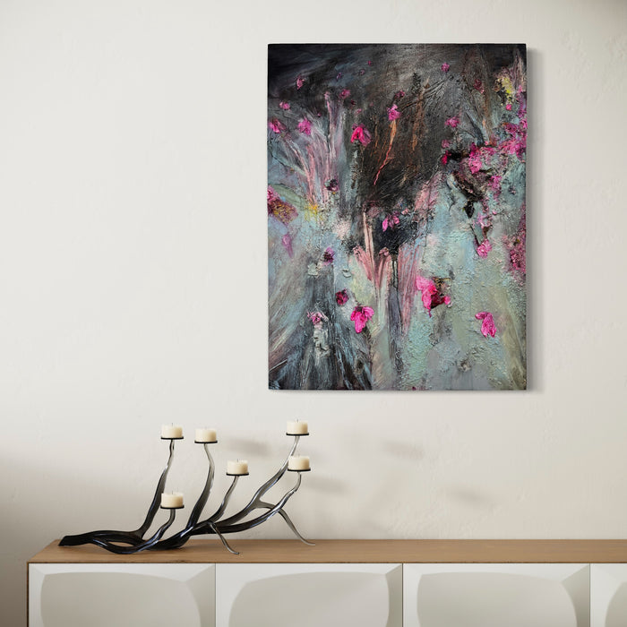 The artwork 'Mommie Dearest's Garden' by Rachel Kohn features explosive brushstrokes of vibrant pink flowers against a moody background of charcoal grays and mint green. Mixed media elements including embroidery thread, glitter, and ribbon create dynamic texture throughout the abstract floral composition, measuring 40x30 inches. The piece combines acrylic paint with dimensional elements for a captivating garden scene. By Rachel Kohn.