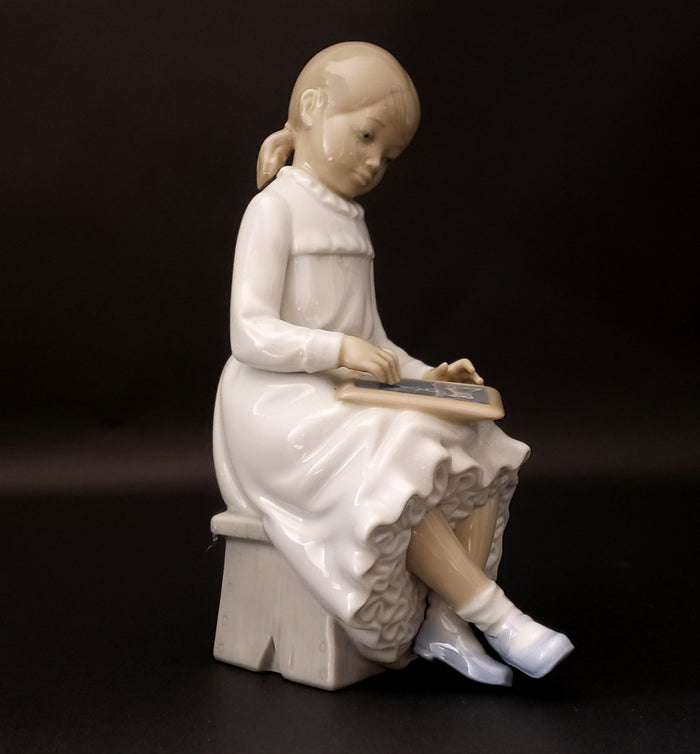 NAO by Lladro Porcelain Figurine Girl With Slate #117 Spain