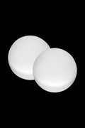 Close-up of two smooth white Pulsar Quartz Terp Beads - 2 Piece Set shown from a slightly elevated angle against a black background