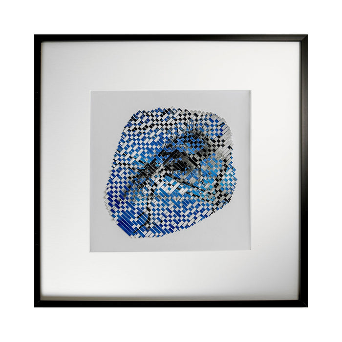 The artwork 'Silhouette' by Kiana Honarmand features an abstract woven pattern in vibrant blue and black checkered design. Hand-cut giclee prints are intricately woven to create a circular formation against a white background, measuring 16x16 inches. The geometric pattern creates a dynamic visual effect with contrasting colors and textures, framed in sleek black. By Kiana Honarmand.