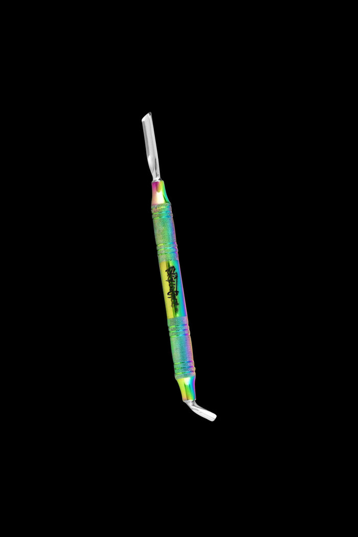 Angled close-up of the Skilletools Anodized Series Dab Tools "Mr. Dabalina" showing its rainbow anodized textured shaft and dual metal tips against a black background.