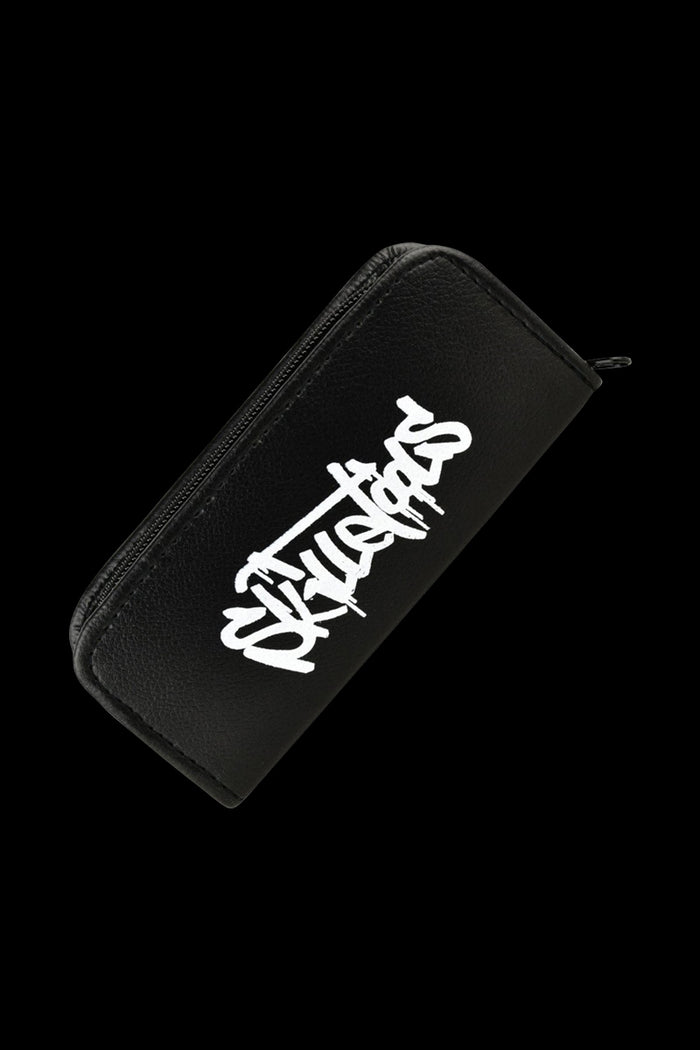 A close-up of the closed Skilletools Travel Kit Dab Handle & Tips, angled slightly on a black background.