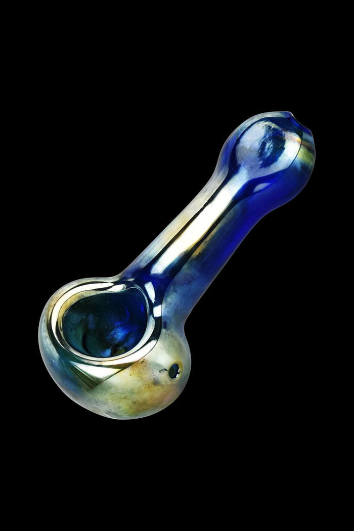 A close-up, angled view of the Lightweight Glass Spoon Pipe - Oil Slick, showcasing its iridescent, swirling colors and curved form.