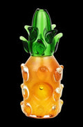A front view of the Spoon Hand Pipe - The Pineapple, showcasing its textured, green and clear glass design.