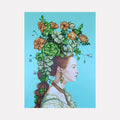 The artwork 'Symbols and Icons II' features an elegant profile portrait adorned with a dramatic floral headpiece combining vibrant green foliage, peach-colored roses, and silvery-white blooms against a bright turquoise background. The subject wears an ornate gold necklace and a delicate mint-colored period dress. Created in acrylic on wood by Carlos Gamez de Francisco.