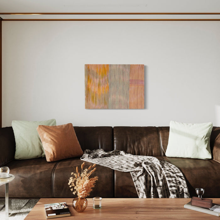 The artwork 'Untitled 107' by Victoria Manganiello features soft pastel hues in peach, yellow, and grey creating an abstract composition with gentle flowing textures. Woven with natural and synthetic fibers, the 24x32 inch piece displays delicate color transitions and subtle fiber patterns that create a serene, ethereal aesthetic.