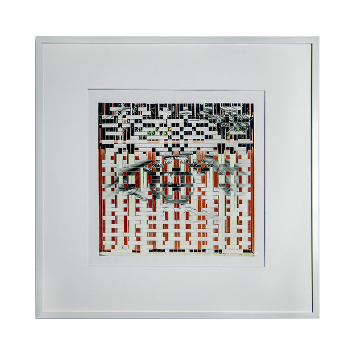 The artwork 'Vermillion Moments' by Kiana Honarmand features a geometric abstract composition of hand-cut and woven giclee prints. A mosaic-like pattern combines black and white pixels in the upper portion, transitioning to vibrant vermillion red segments below. Metallic teal accents create depth in the central area, framed in crisp white matting.