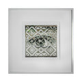 The artwork 'Warning' by Kiana Honarmand features a striking mosaic-style composition depicting an eye created through hand-cut and woven giclee prints. The pixelated pattern combines black, white, and subtle green tones in a geometric arrangement, creating a digital aesthetic within a clean white frame. The eye motif emerges from a checkered pattern with 16x16 inch dimensions.